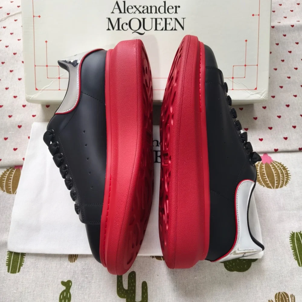 Alexander McQueen Black Leather Sneakers with Red Soles
